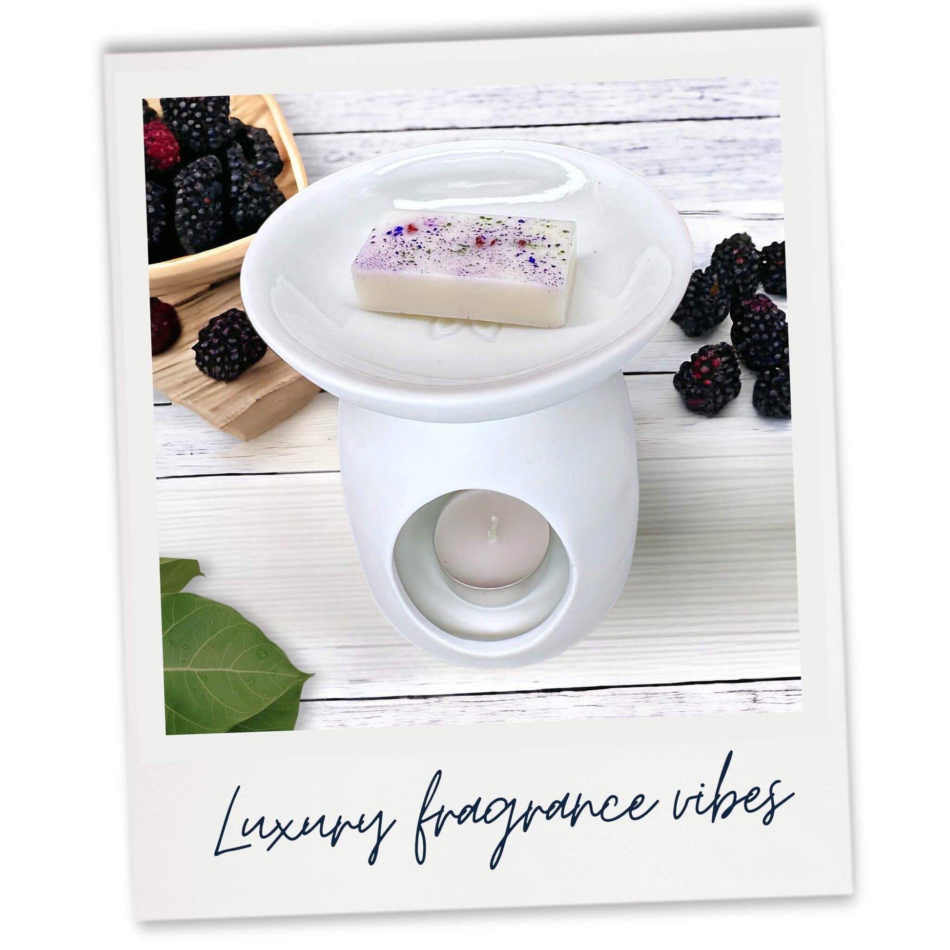 Blackberry and Bay Luxury Wax Melt in white wax warmer. Lifestyle image