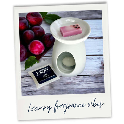 Plum and Rhubarb wax melt in white wax warmer